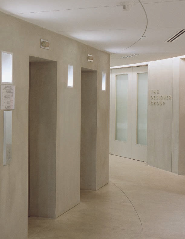 Reflex Recessed Indirect LED Wall Light Shown in Corporate Elevator Lobby
